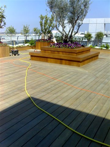 גג בניין חברת מגדל לפני ואחרי